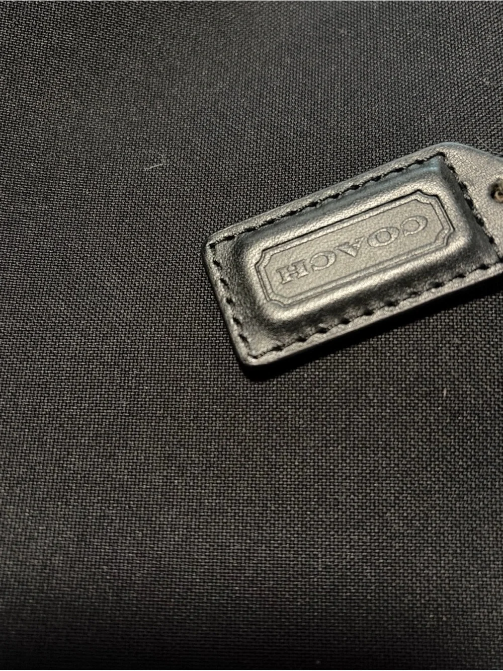 Coach sleek black
